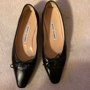 Manolo Blahnik black leather flats.